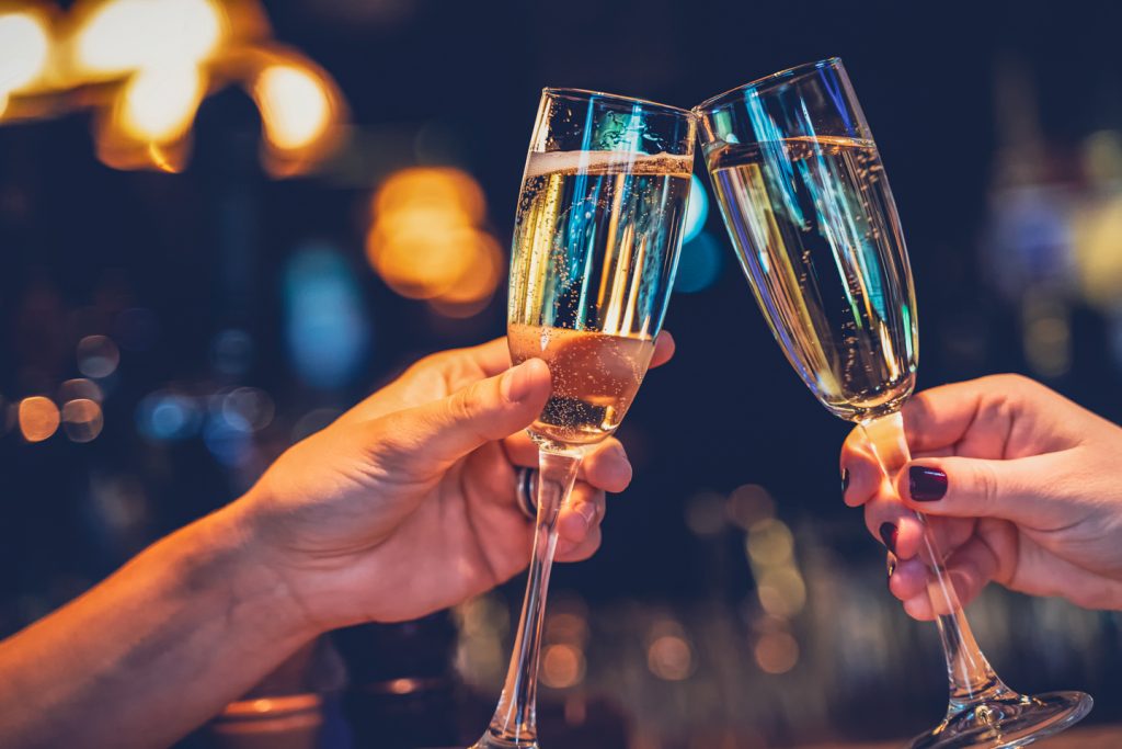 clinking glasses with moscato