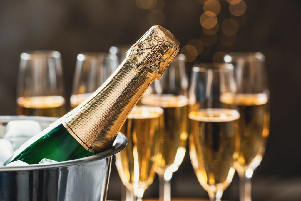 blanc de blancs bottle being chilled in ice